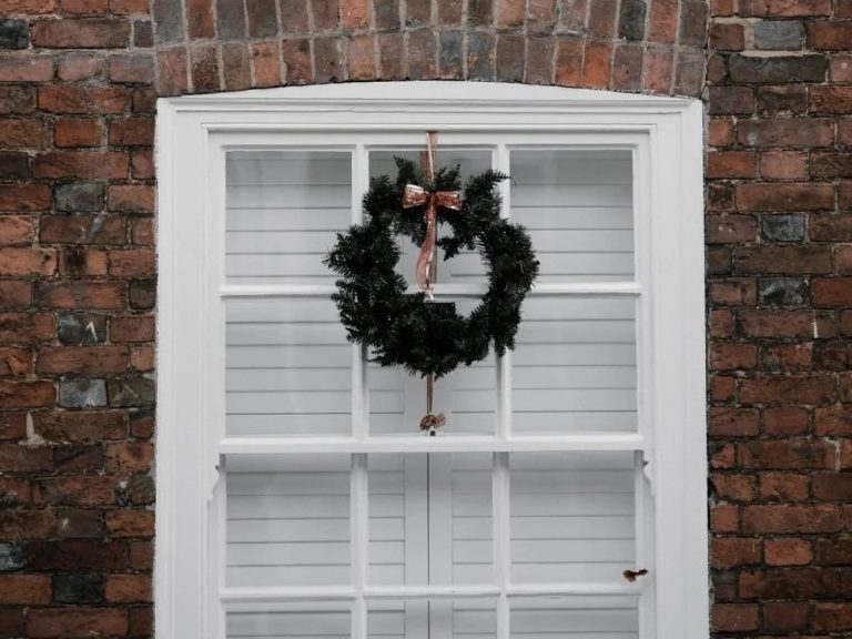 Full height shutters viewed from outside the home