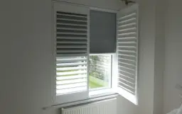 Bedroom shutters with integrated blackout blinds